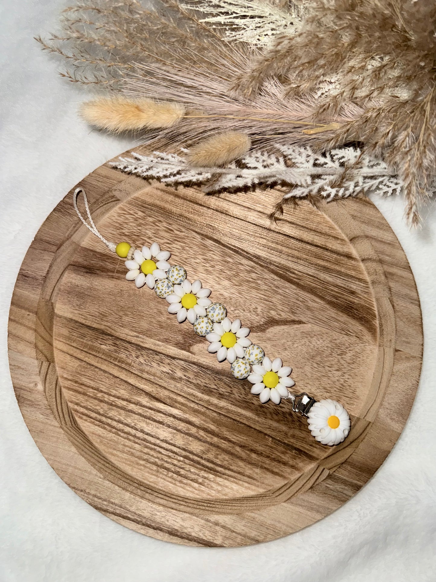 Attache tétine florale