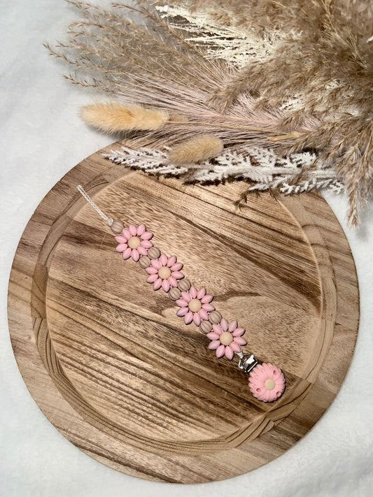 Attache tétine florale